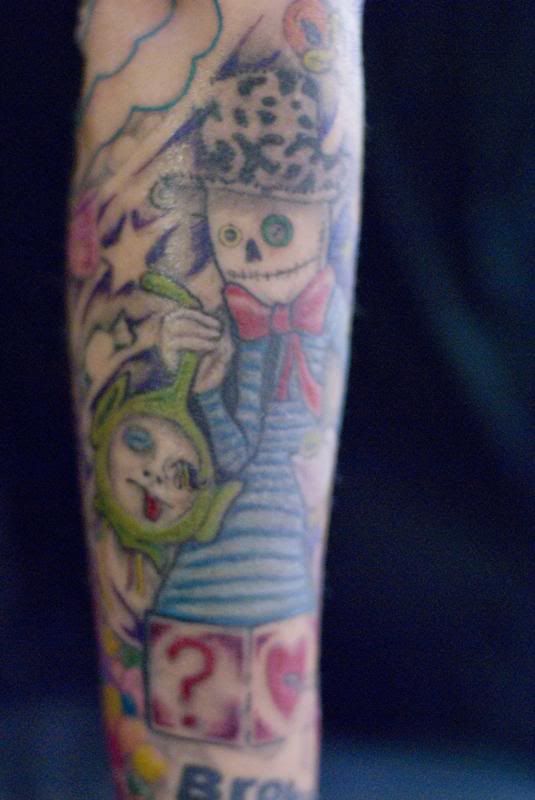 Franki Doll Jack In The Box Arm Tattoo Photo by